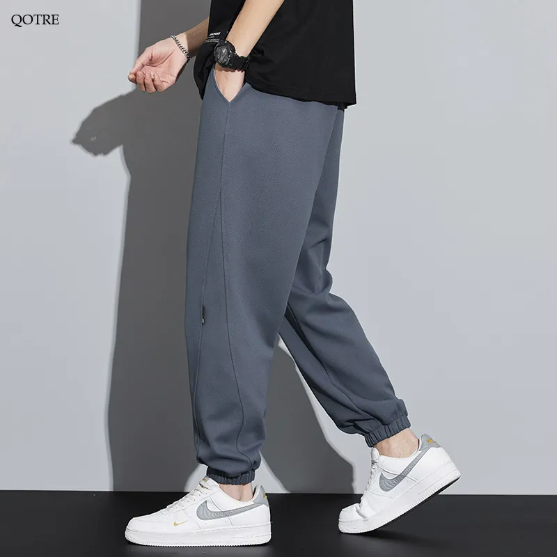 Drawstring Knitted Solid Color Tapered Loose Fit Sweatpant