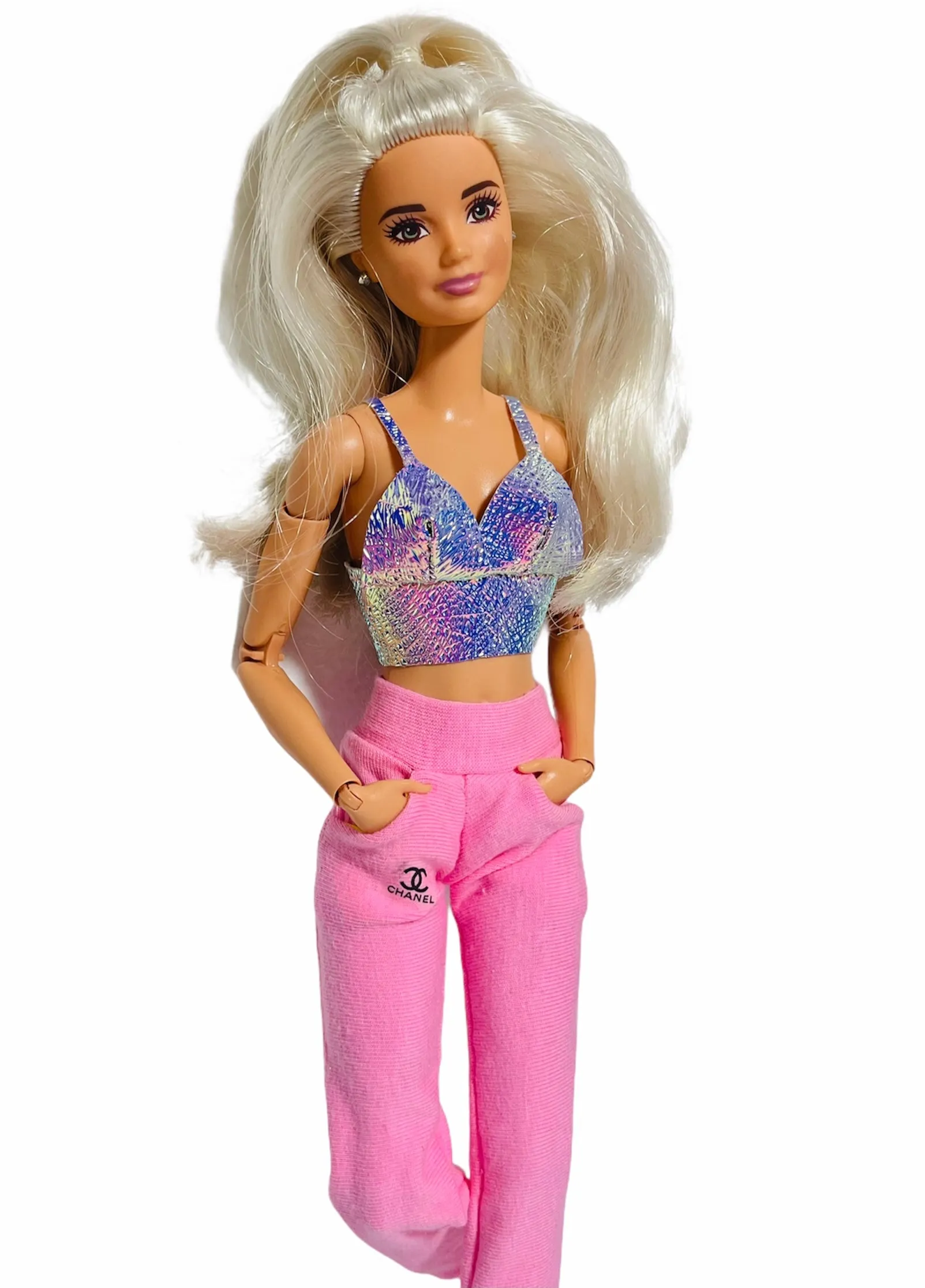 Pink sweatpants for Barbie dolls with pockets