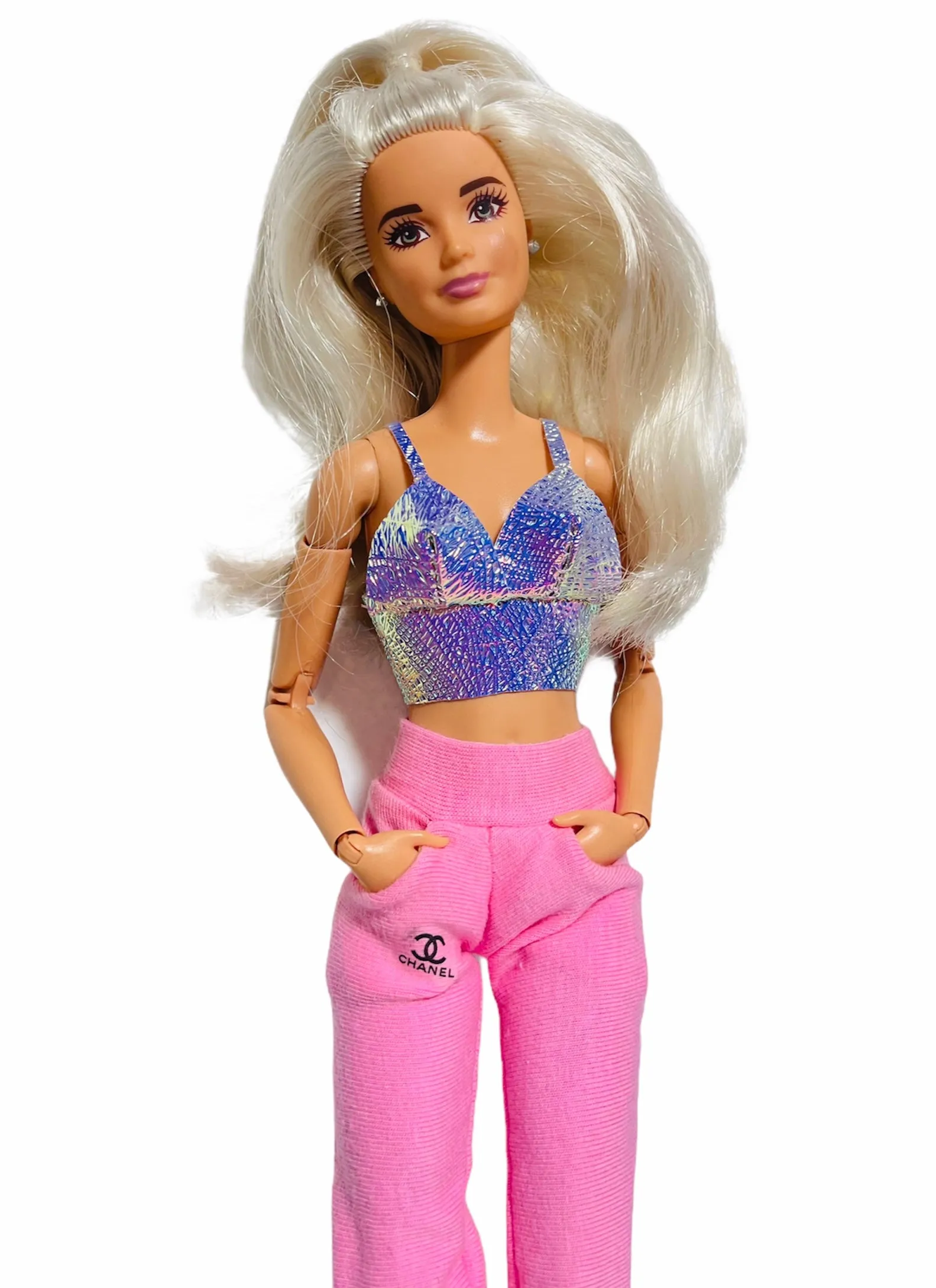 Pink sweatpants for Barbie dolls with pockets